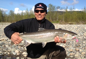 Bruce Landereis holding a 12lb Steelehead caught on the upper Kitimat River. 